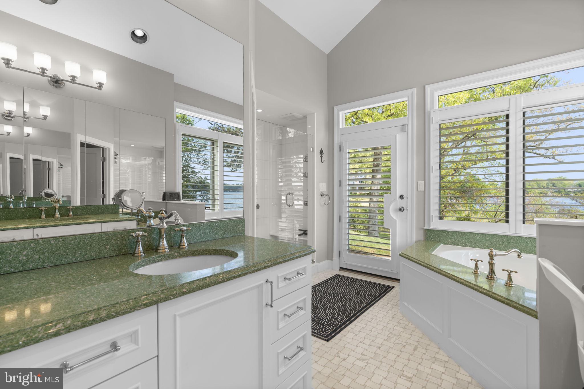 674 Hendler Road Severna Park, MD 21146 - Photo 24 of 48 a kitchen with granite countertop a sink and a large window