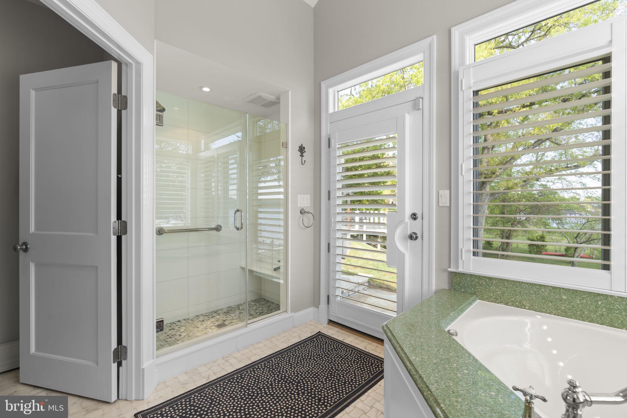 674 Hendler Road Severna Park, MD 21146 - Photo 25 of 48 a bathroom with a glass shower door
