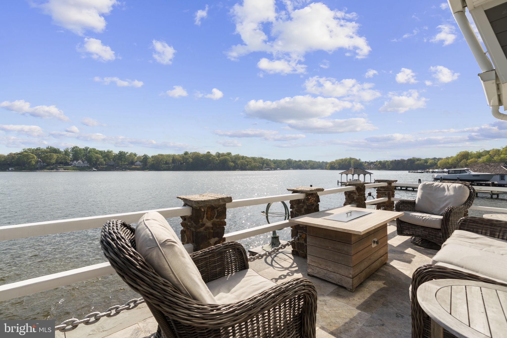 674 Hendler Road Severna Park, MD 21146 - Photo 26 of 48 a view of a terrace with couches and city view