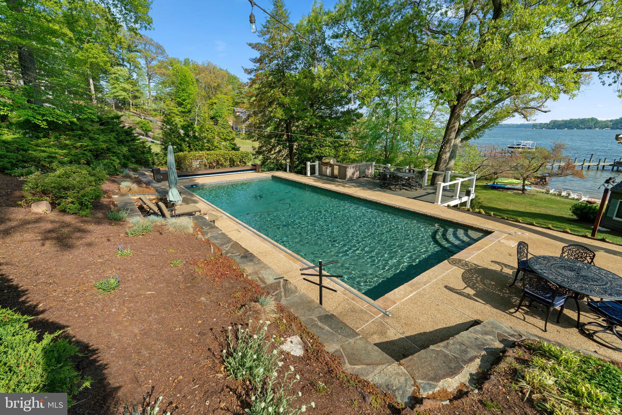 674 Hendler Road Severna Park, MD 21146 - Photo 28 of 48 a view of a backyard with a garden