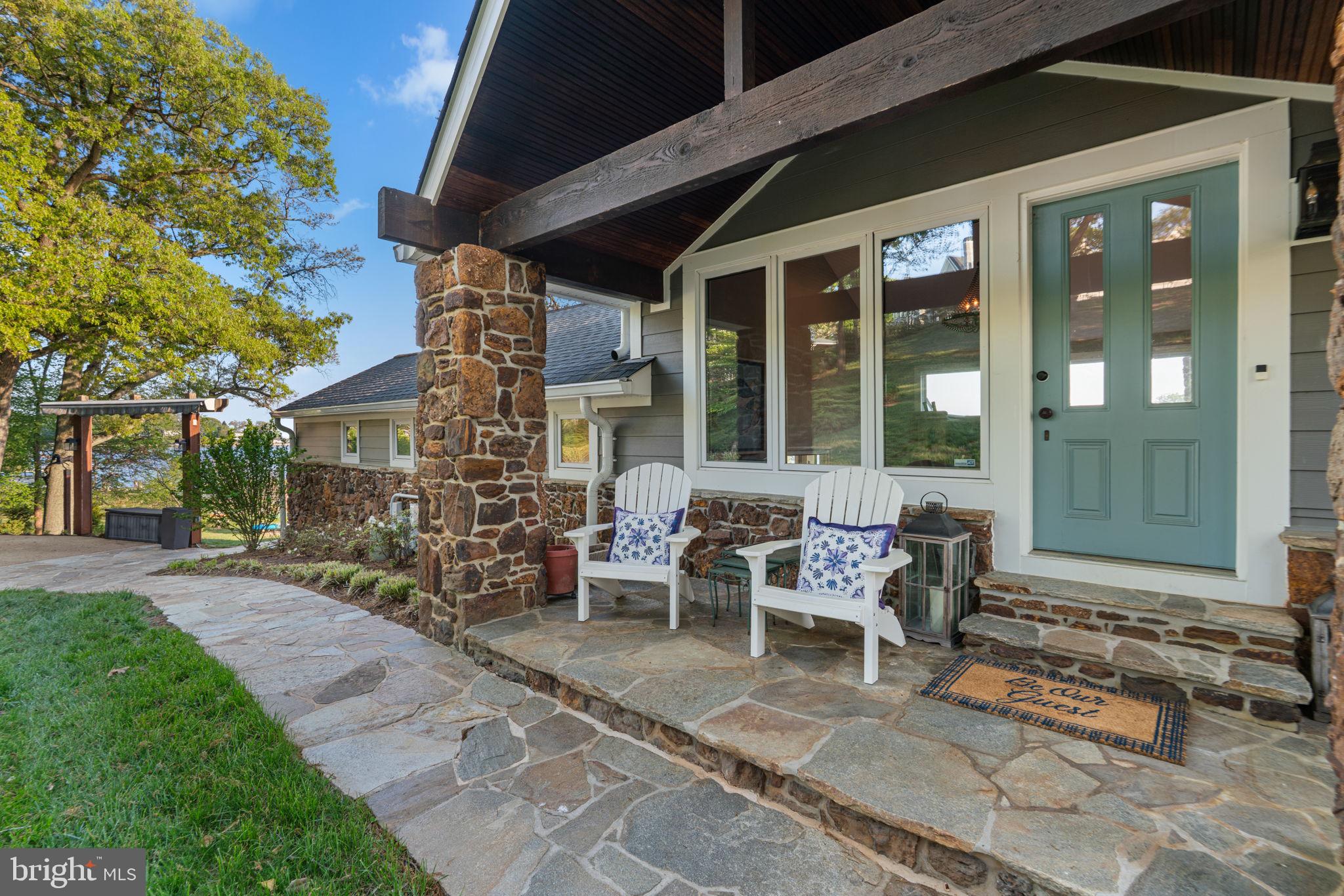 674 Hendler Road Severna Park, MD 21146 - Photo 4 of 48 a backyard of a house with outdoor seating