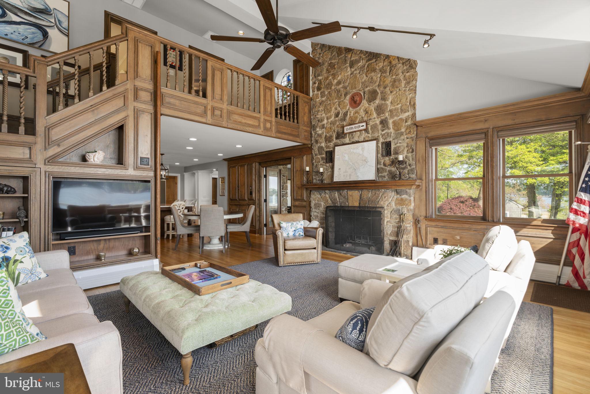 674 Hendler Road Severna Park, MD 21146 - Photo 7 of 48 a living room with fireplace furniture and a flat screen tv