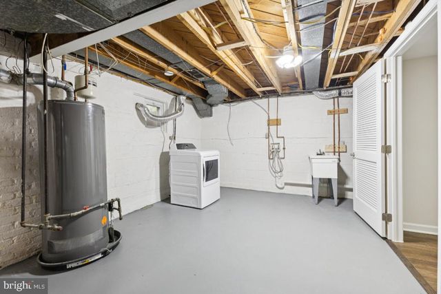 a view of outdoor space with deck and yard