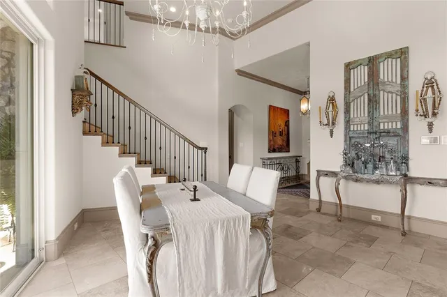 a view of a livingroom with furniture wooden floor and windows