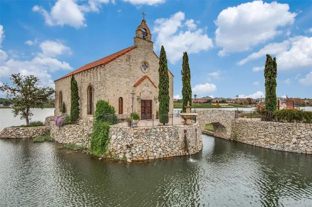 a view of a lake with a house