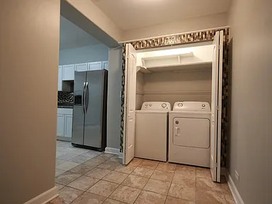 1922 West 47th Street, Unit 2 Chicago, IL 60609 - Photo 16 of 20 a utility room with dryer and washer