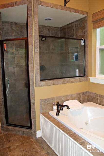 5375 Greentree Road Orange Beach, AL 36561 - Photo 10 of 25 Tiled walk-in shower with separate jetted tub