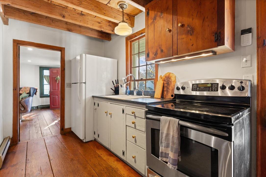 1507 River Road New Hope, PA 18938 - Photo 5 of 22 Cozy kitchen with rustic beams.
