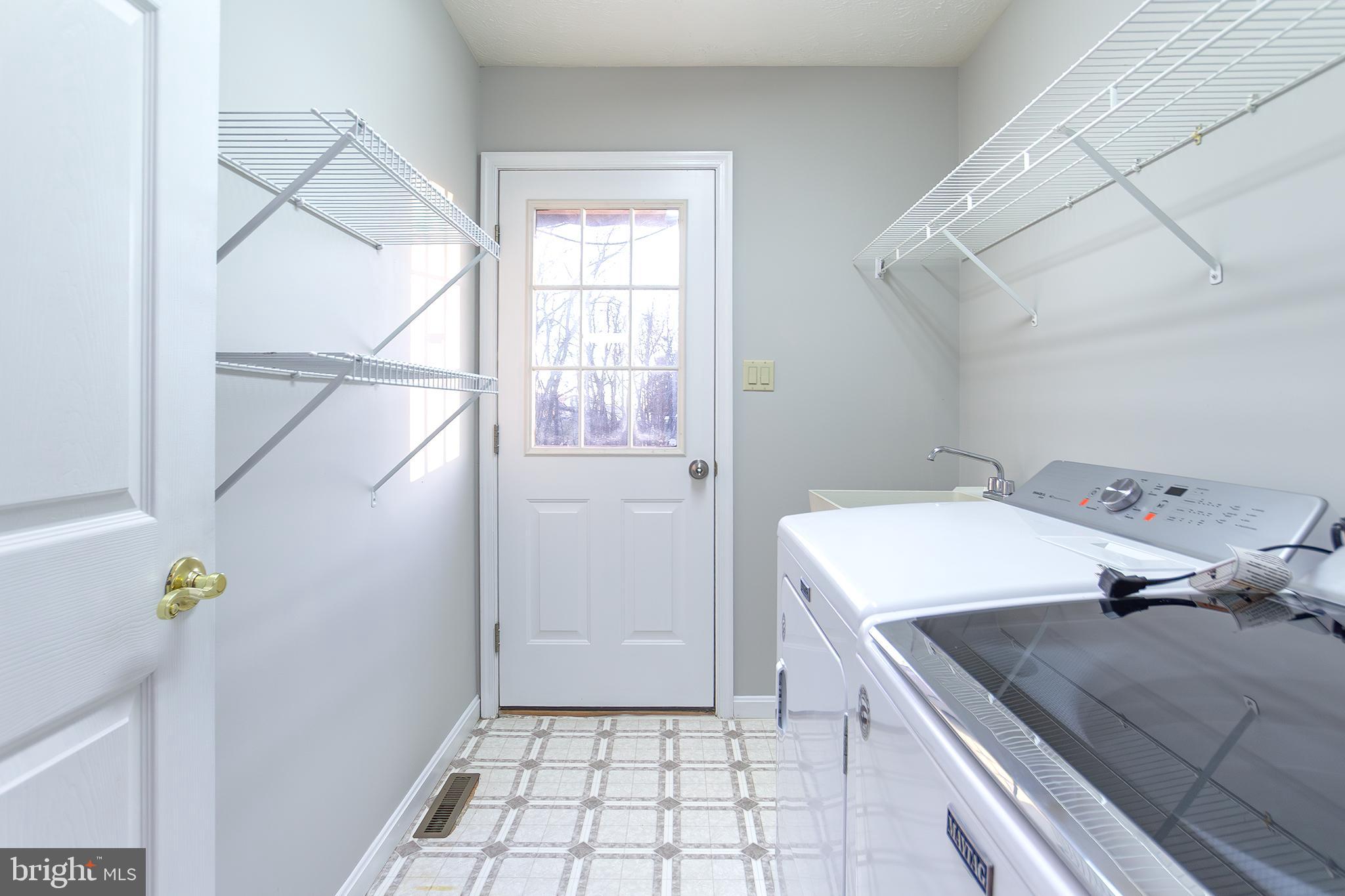 19930 Old York Road White Hall, MD 21161 - Photo 22 of 46 a room with storage and utility