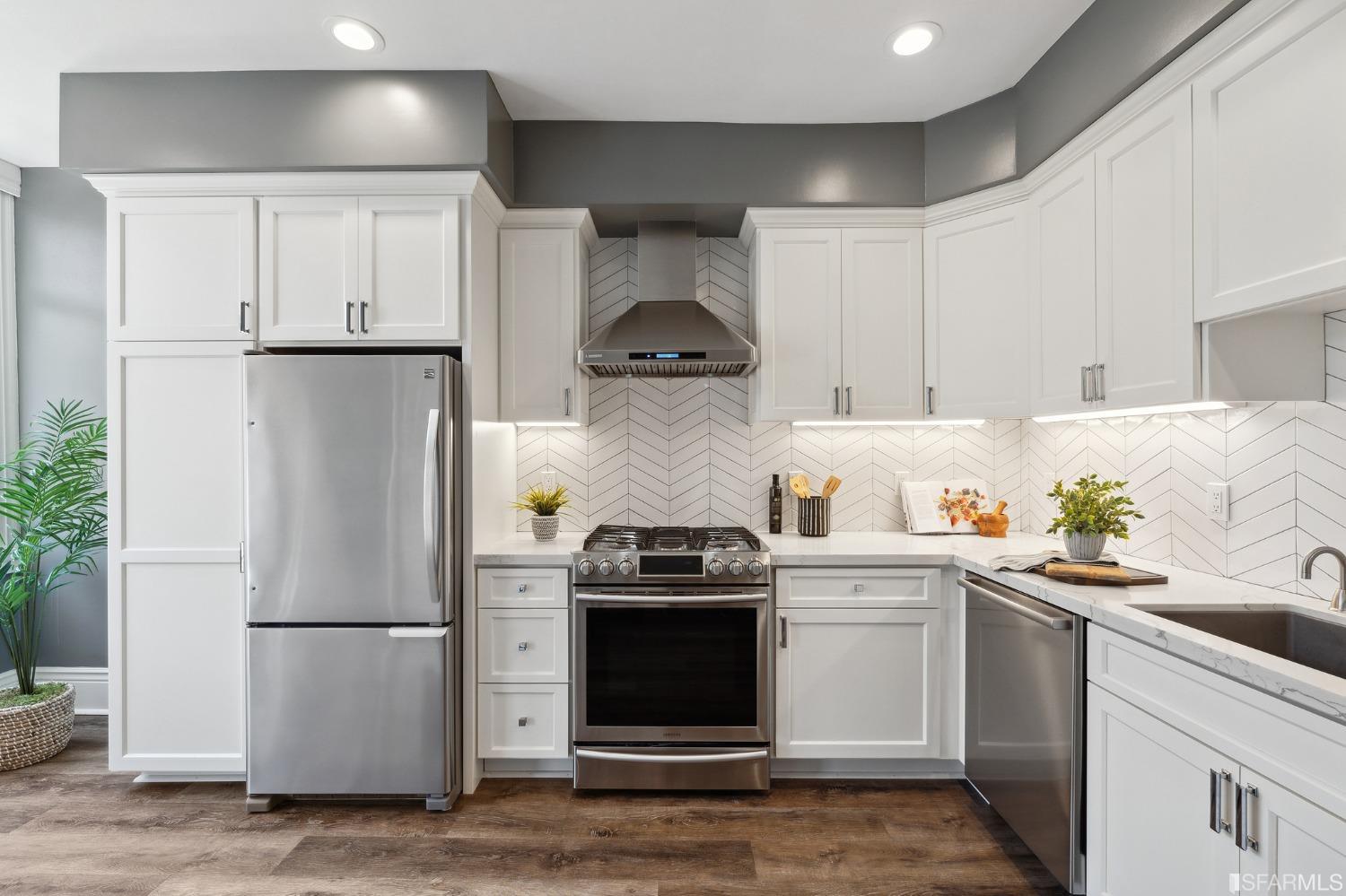 445 Clipper Street San Francisco, CA 94114 - Photo 12 of 62 a kitchen with a stove top oven and refrigerator