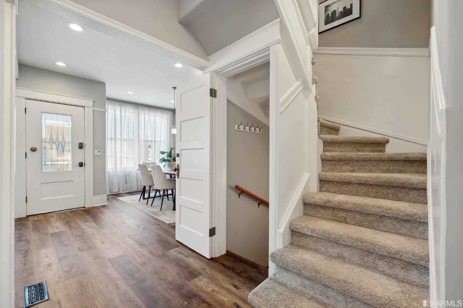 445 Clipper Street San Francisco, CA 94114 - Photo 27 of 62 a view of entryway with wooden floor and a livingroom view