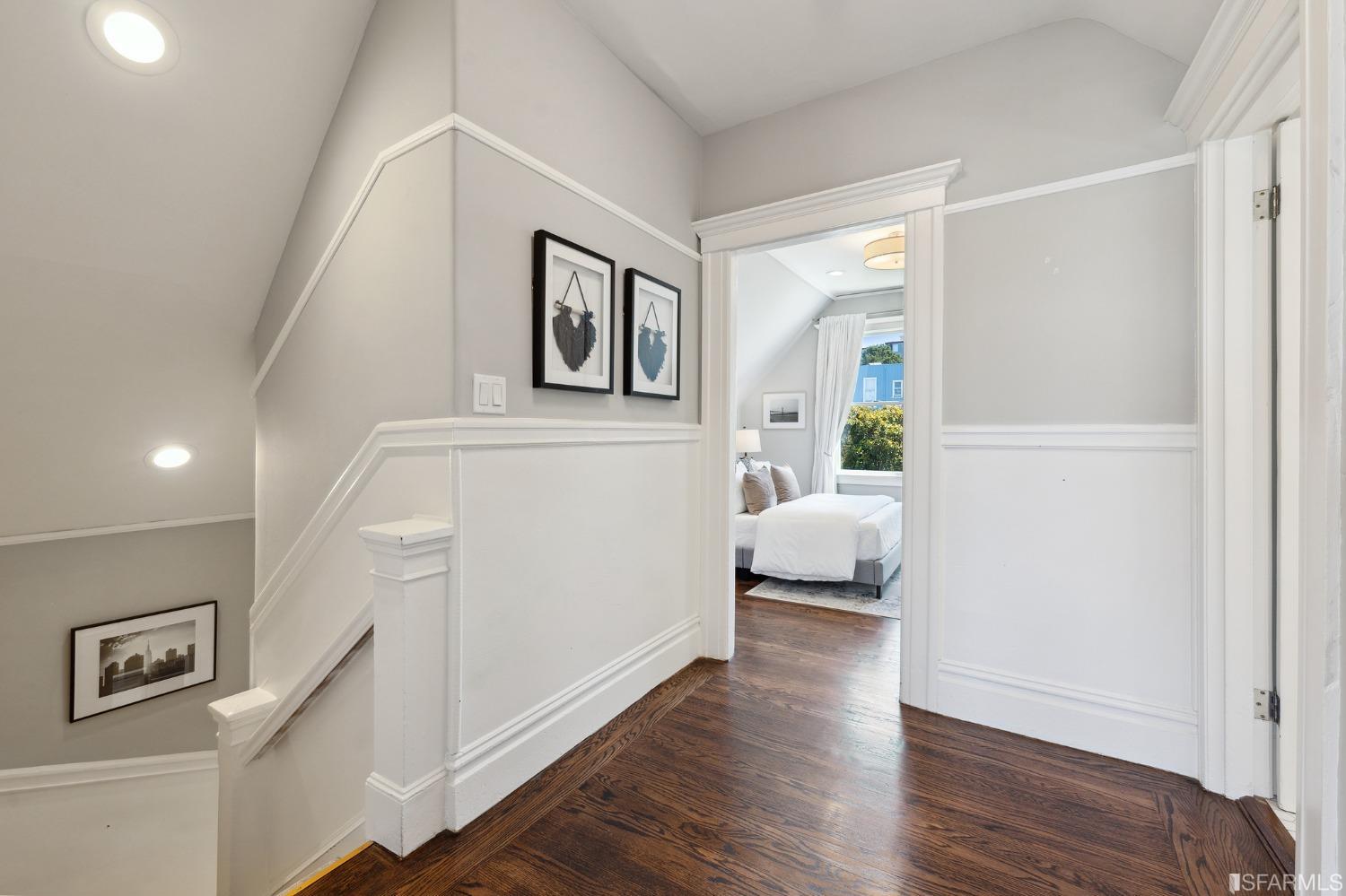 445 Clipper Street San Francisco, CA 94114 - Photo 28 of 62 a bedroom with a bed and a couch