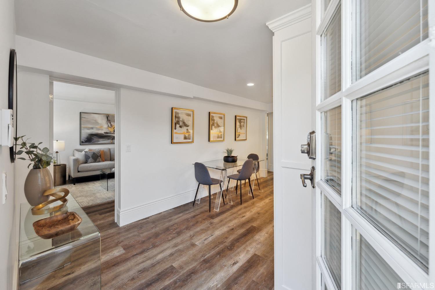 445 Clipper Street San Francisco, CA 94114 - Photo 42 of 62 a view of a livingroom with furniture and a wooden floor