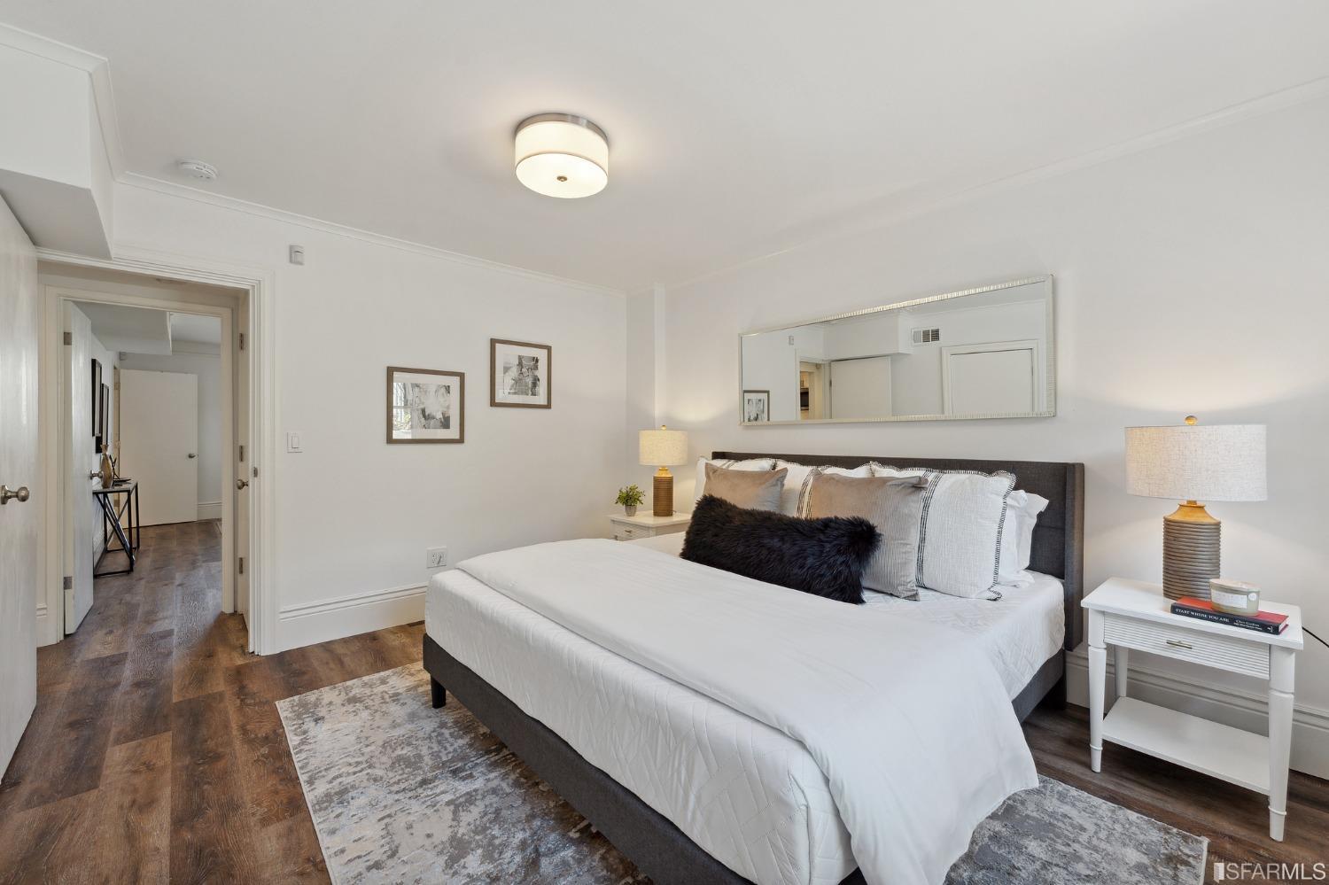 445 Clipper Street San Francisco, CA 94114 - Photo 53 of 62 a bedroom with a bed and a couch