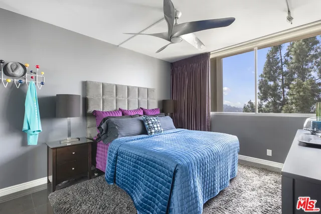 a bathroom with a sink vanity and a mirror