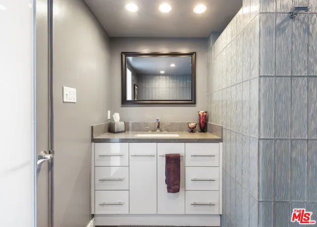 a view of a swimming pool with a lawn chairs