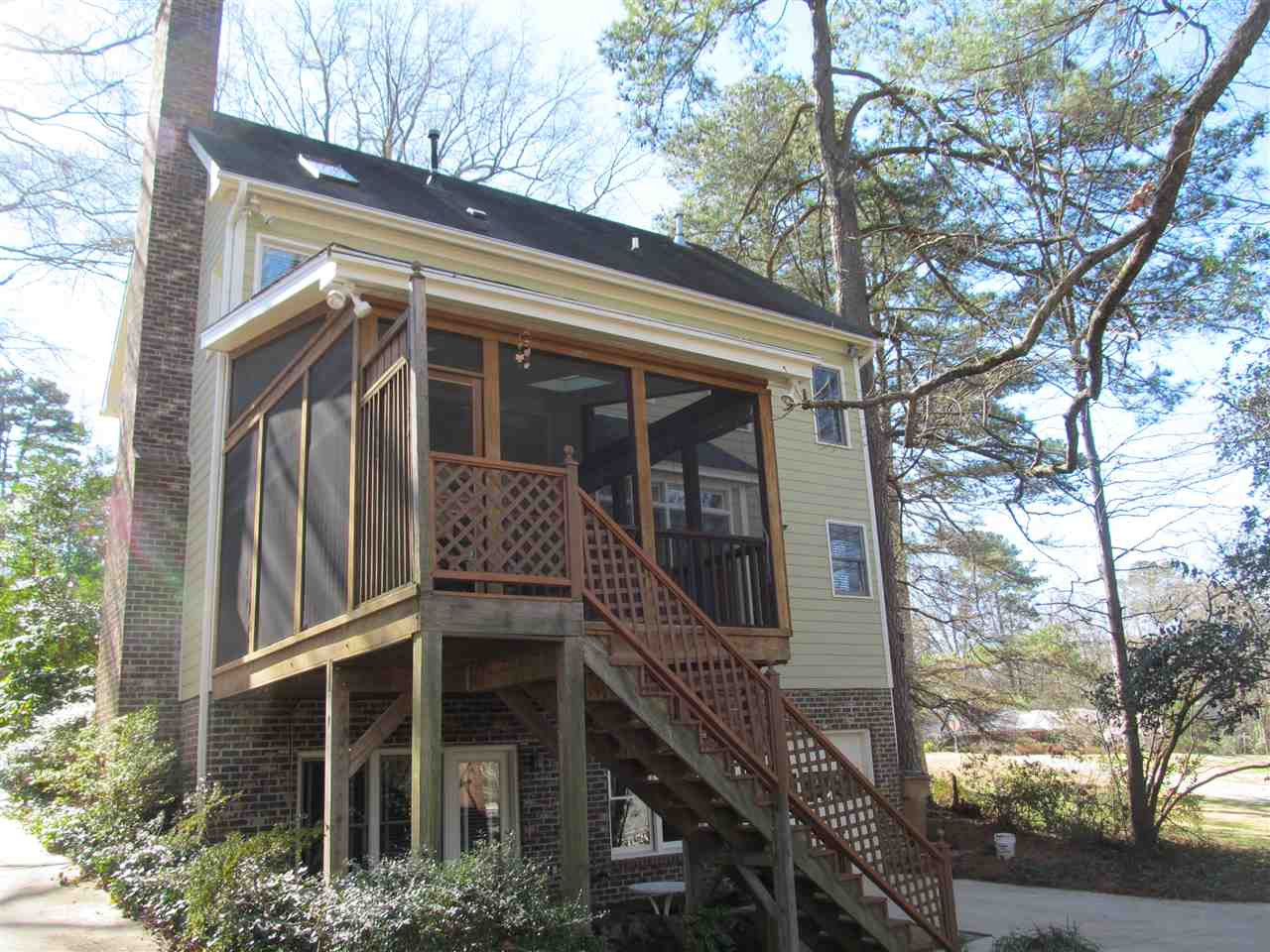 2506 Mayview Road Raleigh, NC 27607 - Photo 2 of 29 The lovely screened porch is just off the living room and overlooks a backyard that has lots of wildlife. Exterior Back