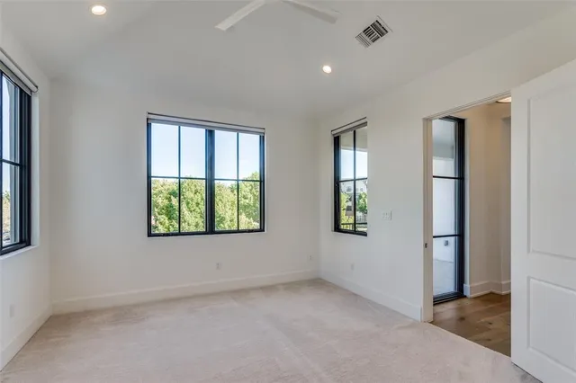 a bathroom with a double vanity sink mirror double and bathtub