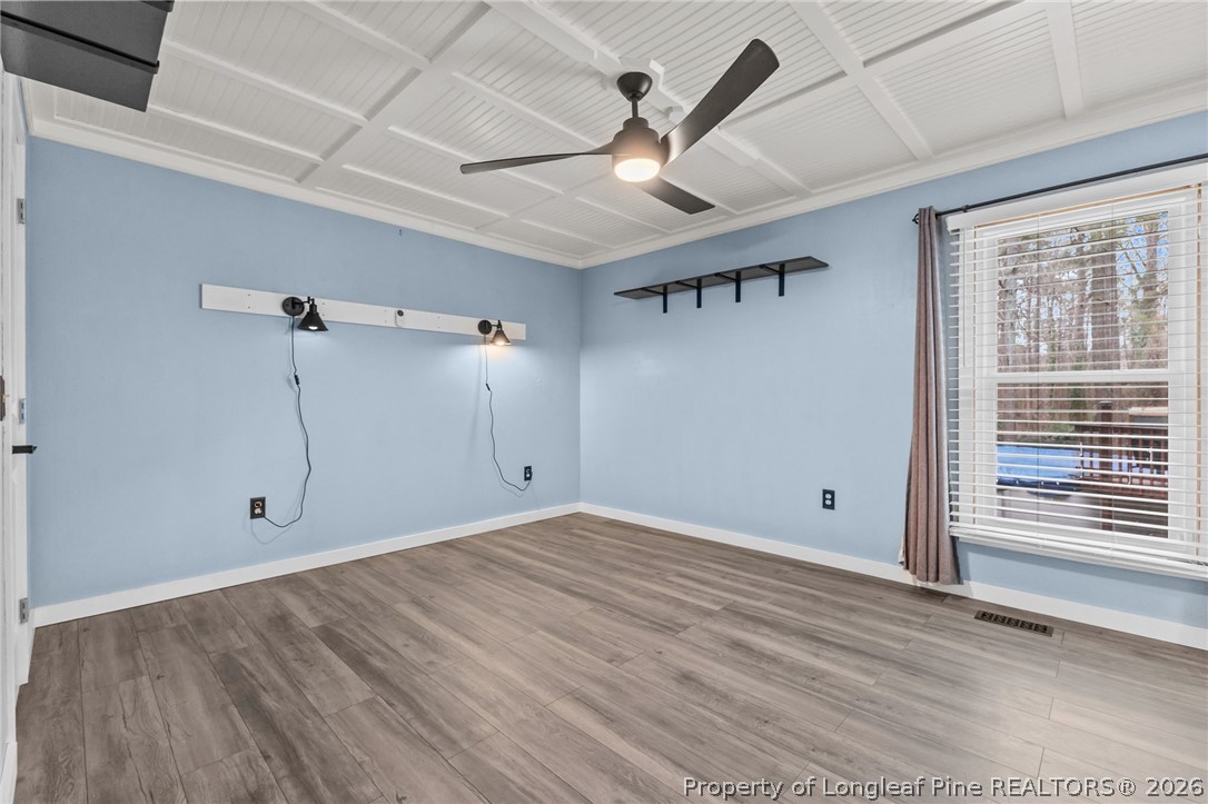 237 Lemuel Black Road Bunnlevel, NC 28323 - Photo 5 of 37 a view of an empty room with a window