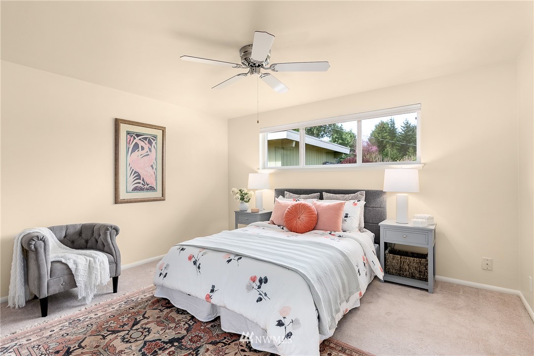 7139 South Sunnycrest Road Seattle, WA 98178 - Photo 14 of 28 a bedroom with a bed and a couch