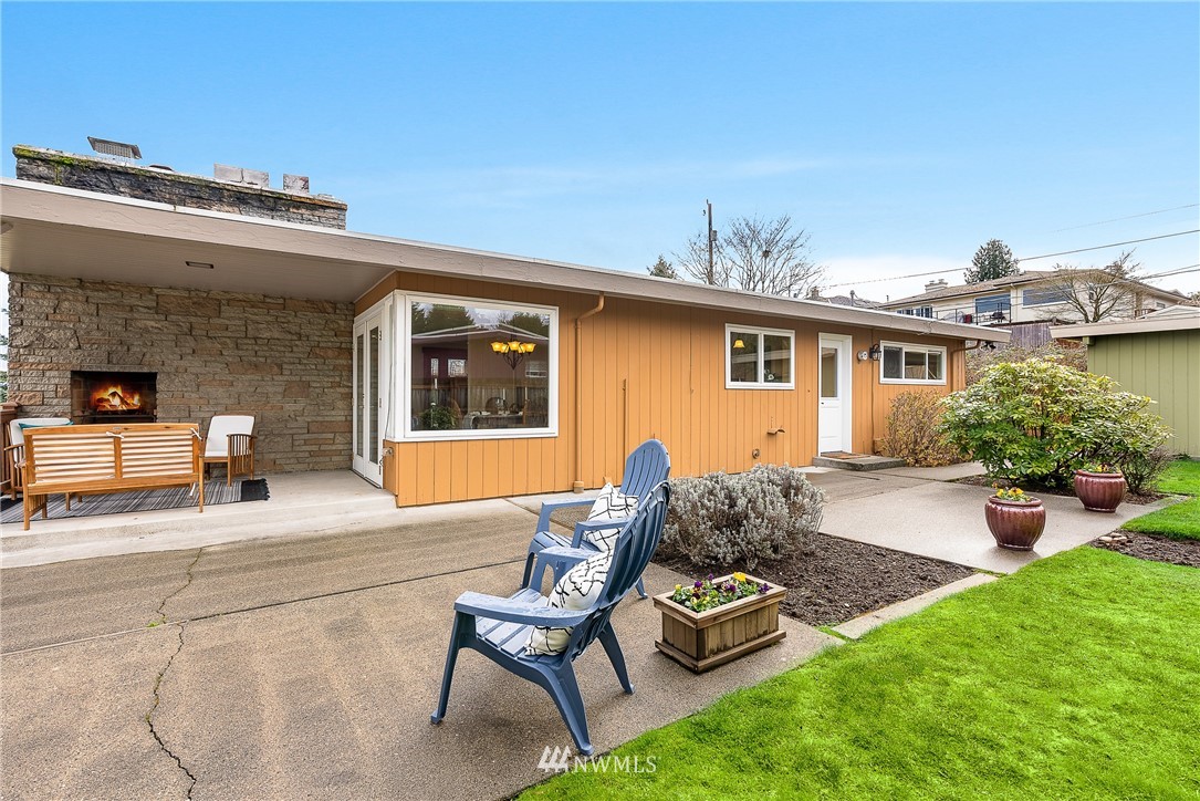 7139 South Sunnycrest Road Seattle, WA 98178 - Photo 20 of 28 a front view of house with yard outdoor seating and barbeque oven