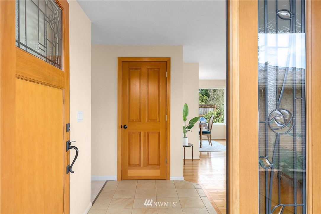 7139 South Sunnycrest Road Seattle, WA 98178 - Photo 28 of 28 a view of hallway with livingroom and wooden floor