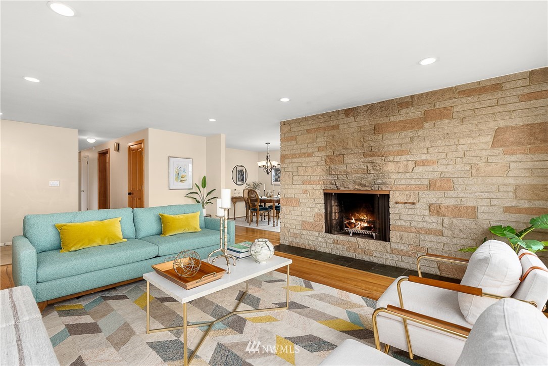 7139 South Sunnycrest Road Seattle, WA 98178 - Photo 5 of 28 a living room with furniture and a fireplace