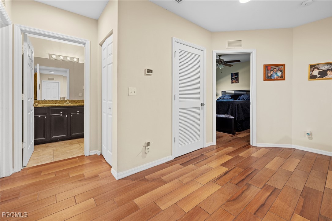 8657 Sumner Avenue Fort Myers, FL 33908 - Photo 13 of 29 a view of livingroom with hallway and closet