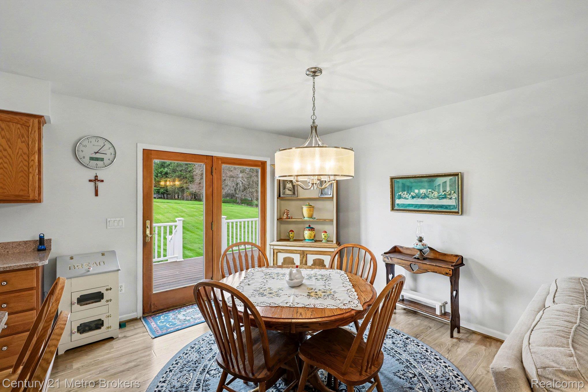 3861 5 Lakes Road Lapeer, MI 48446 - Photo 11 of 30 Dining space with light wood-style floors and baseboards