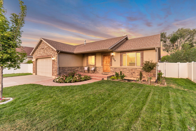 356 North 230 West Payson, UT 84651 - Photo 45 of 45 Ranch-style exterior featuring a stucco and stone facade with brick accents