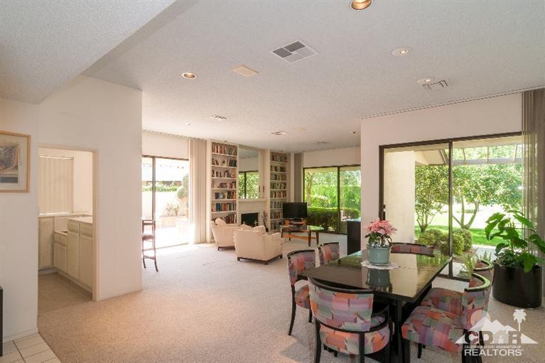 11 Wake Forest Court Rancho Mirage, CA 92270 - Photo 11 of 25 a view of a livingroom with furniture and a large window