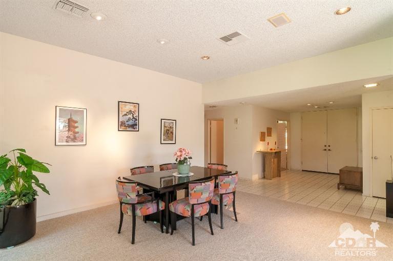 11 Wake Forest Court Rancho Mirage, CA 92270 - Photo 14 of 25 a view of a dining room with furniture