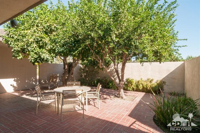11 Wake Forest Court Rancho Mirage, CA 92270 - Photo 2 of 25 a view of a tables and chairs in a patio
