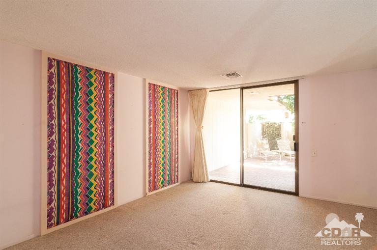 11 Wake Forest Court Rancho Mirage, CA 92270 - Photo 21 of 25 a view of a room with toys and a window