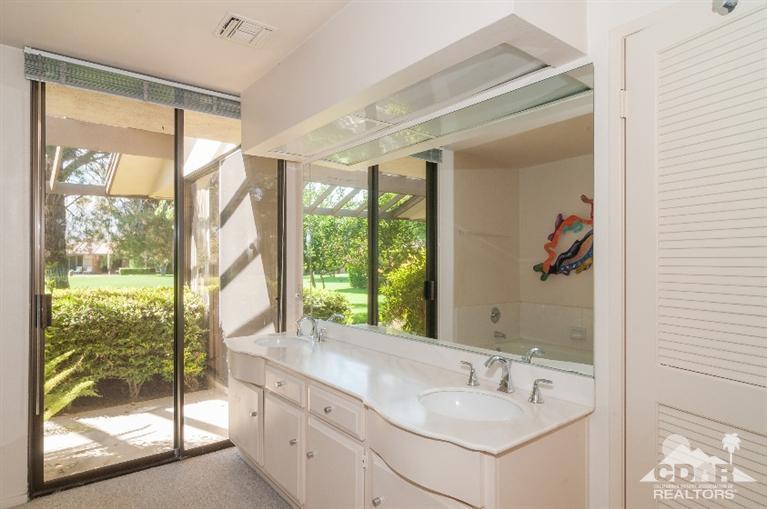 11 Wake Forest Court Rancho Mirage, CA 92270 - Photo 25 of 25 a bathroom with a sink and a mirror