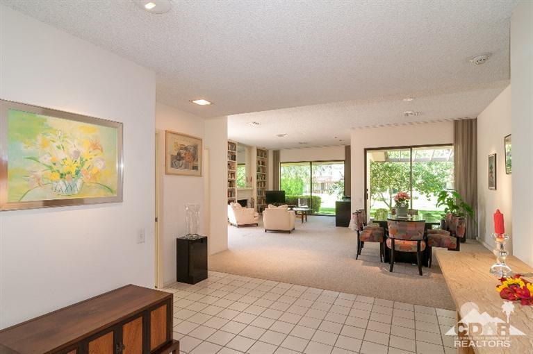 11 Wake Forest Court Rancho Mirage, CA 92270 - Photo 10 of 25 a room with furniture and a large window