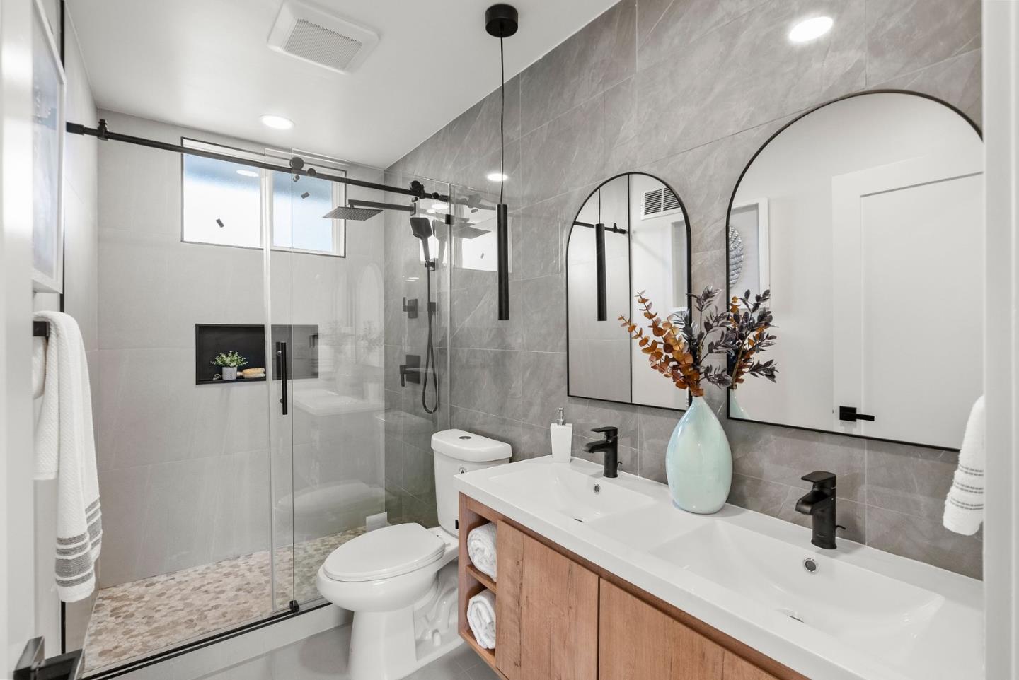 384 Lynbrook Drive Pacifica, CA 94044 - Photo 21 of 40 a bathroom with a toilet sink and shower