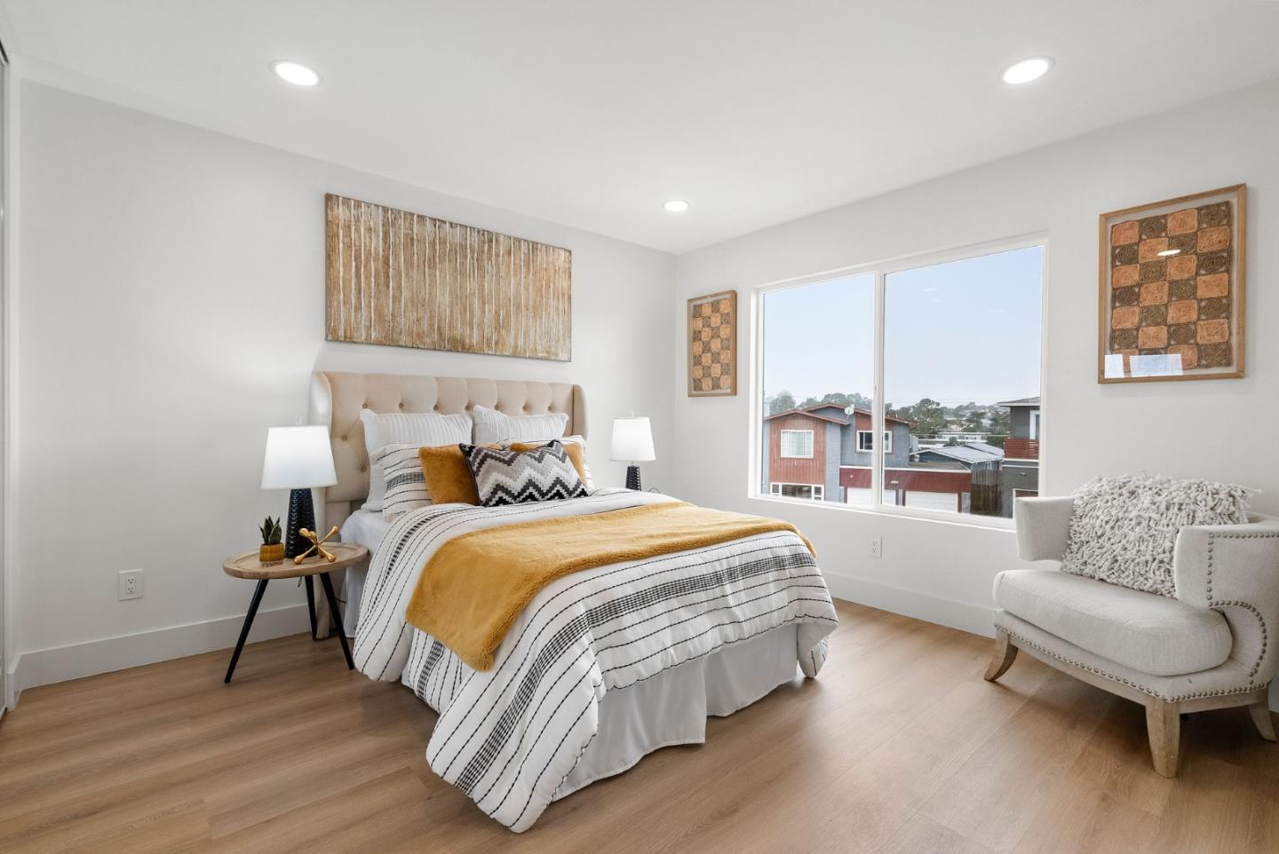 384 Lynbrook Drive Pacifica, CA 94044 - Photo 22 of 40 a bedroom with a bed and a couch