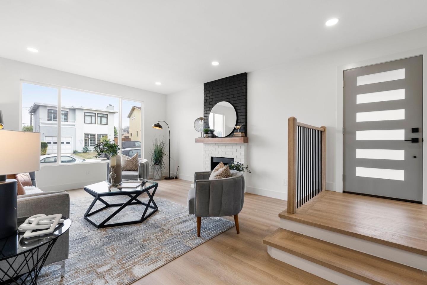 384 Lynbrook Drive Pacifica, CA 94044 - Photo 4 of 40 a living room with furniture and a wooden floor