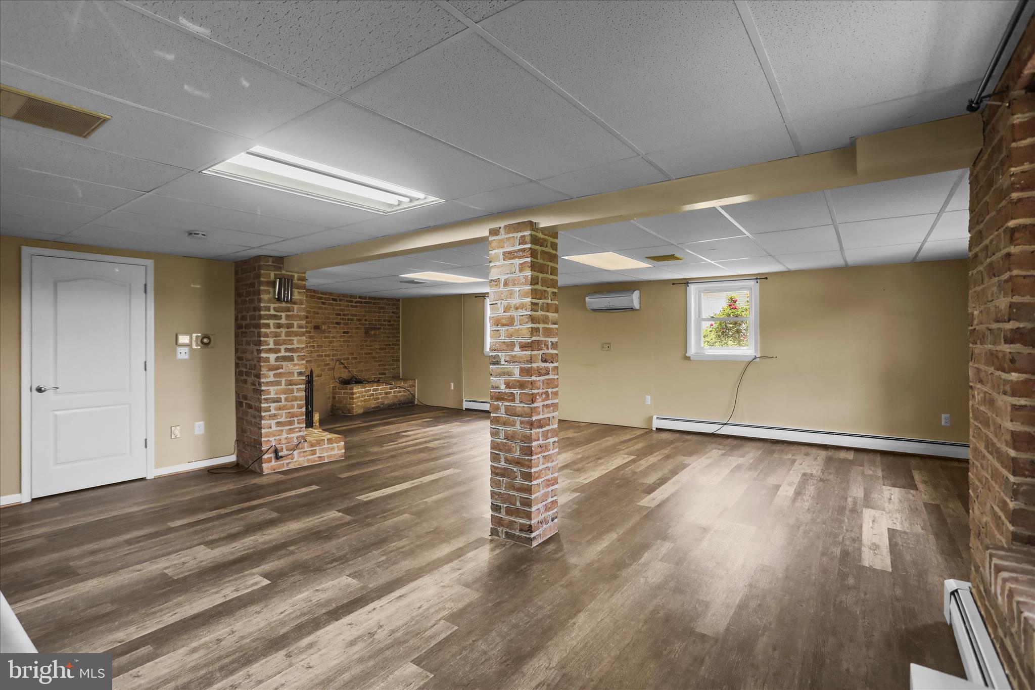 88 Sunset Drive Hanover, PA 17331 - Photo 28 of 51 an empty room with wooden floor and natural light