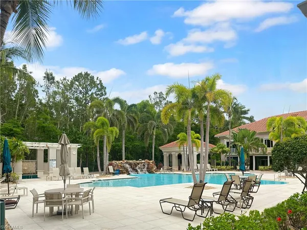 a view of empty room with ceiling fan