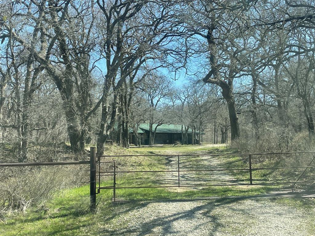 3141 Rogers Road Jacksboro, TX 76458 - Photo 15 of 40 a view of a backyard
