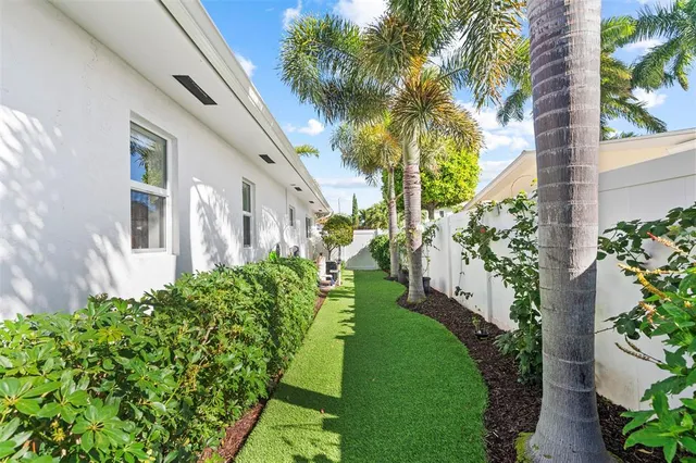 a view of a yard in front of a house