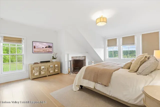 a bathroom with a sink a vanity and a mirror