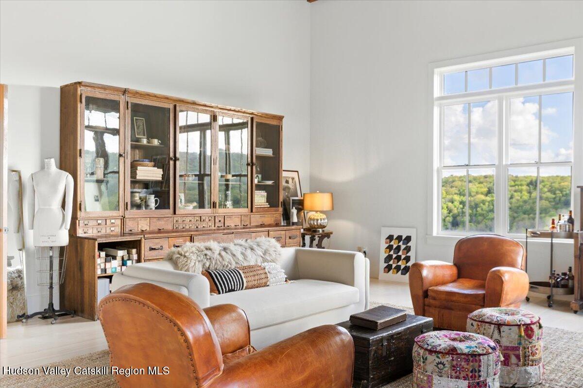 150 Harrington Drive Austerlitz, NY 12017 - Photo 6 of 82 a living room with furniture and a large window