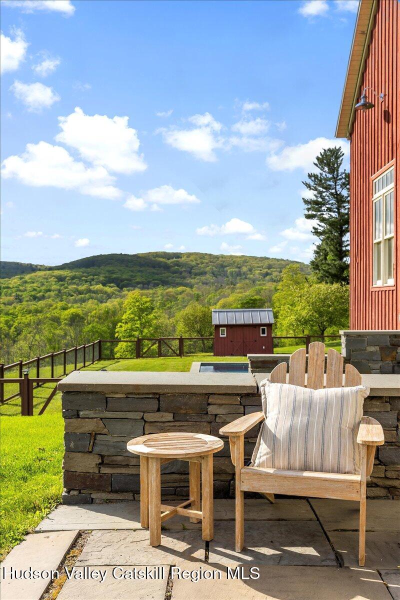150 Harrington Drive Austerlitz, NY 12017 - Photo 81 of 82 a view of swimming pool with outdoor seating and yard in back