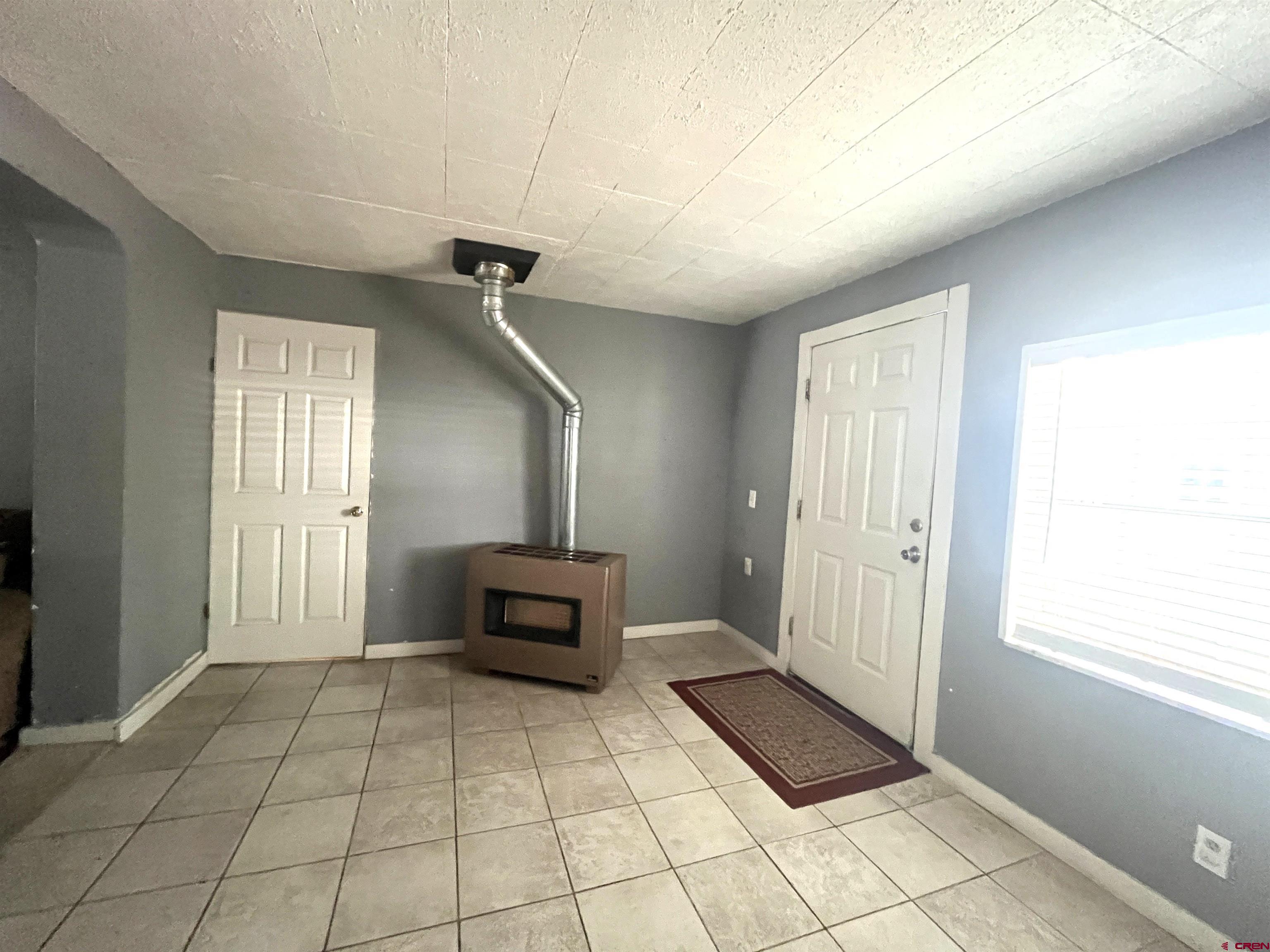 204 South Chestnut Street Cortez, CO 81321 - Photo 15 of 32 a view of livingroom with furniture and windows