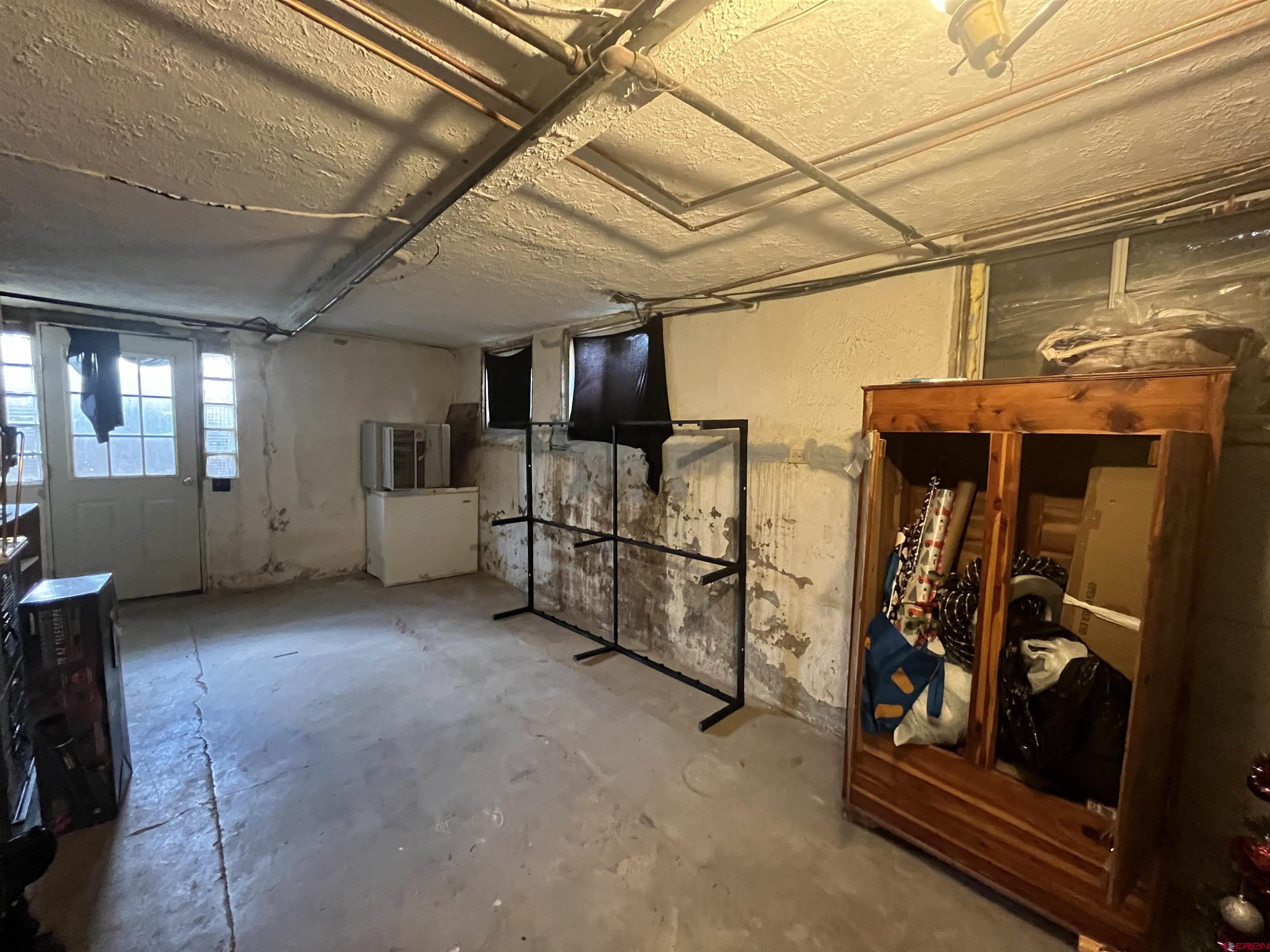 204 South Chestnut Street Cortez, CO 81321 - Photo 17 of 32 a view of a room with gym equipment