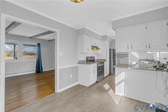 a view of an empty room and window