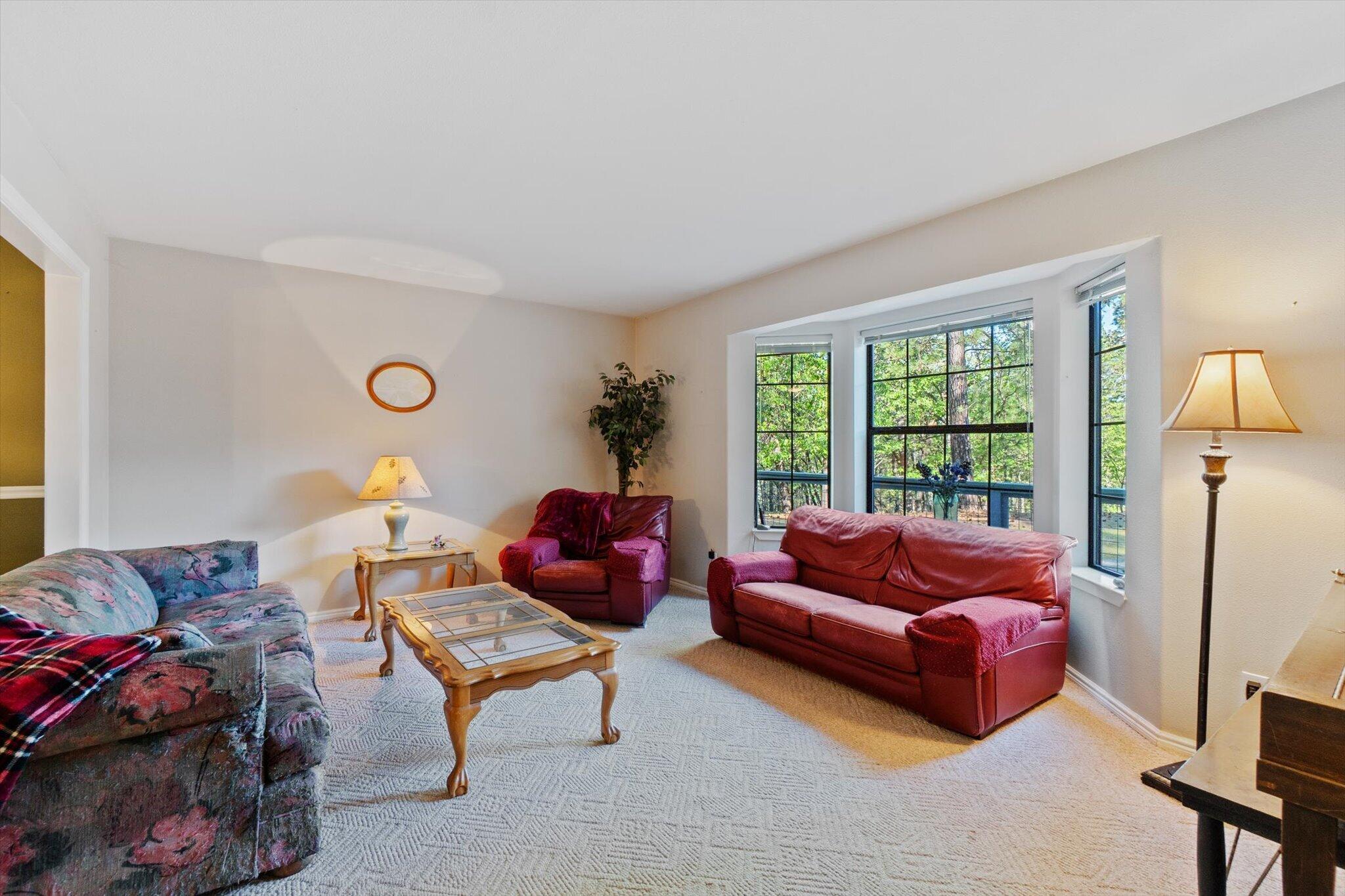 26997 Lookout Mountain Road Oak Run, CA 96069 - Photo 24 of 92 a living room with furniture and a window